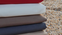 Des toiles de parasol dans différents coloris 